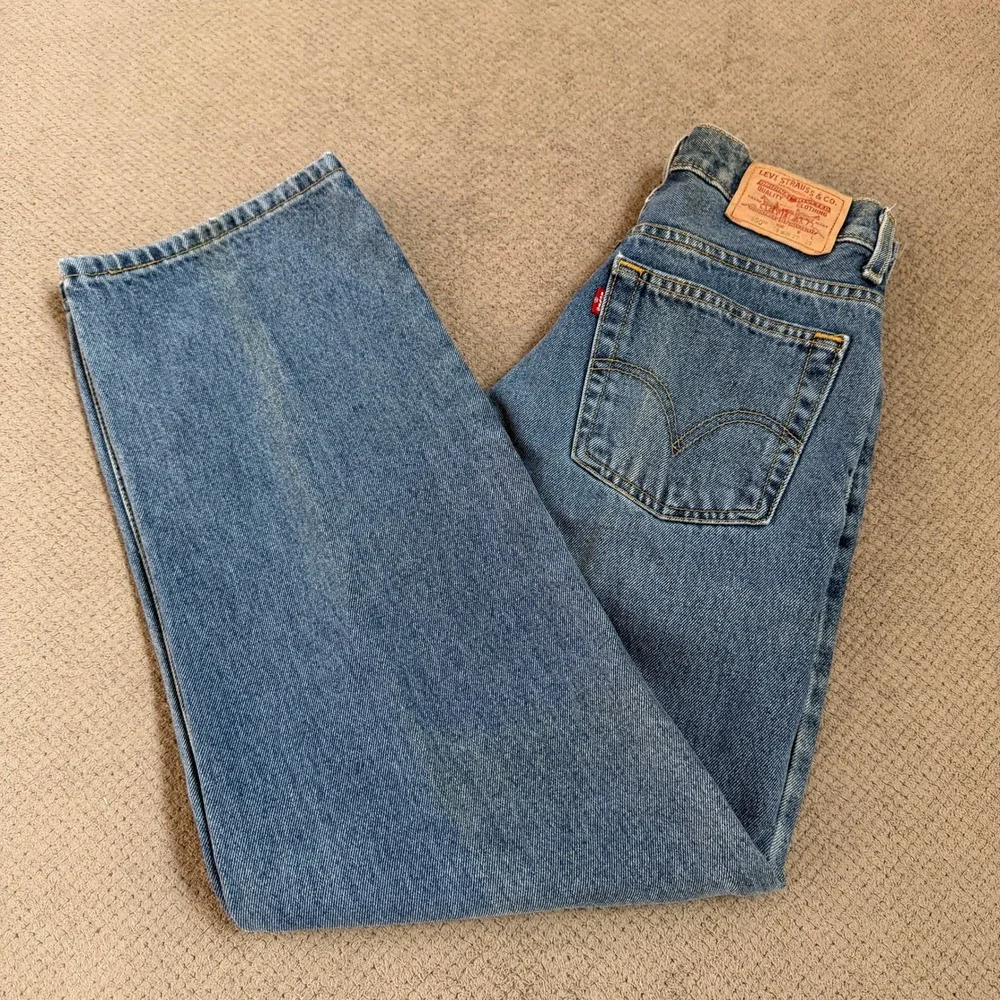 Vintage 1990s Levi's 550 Relaxed Fit Jeans Medium Wash Denim 18 Slim 27x29